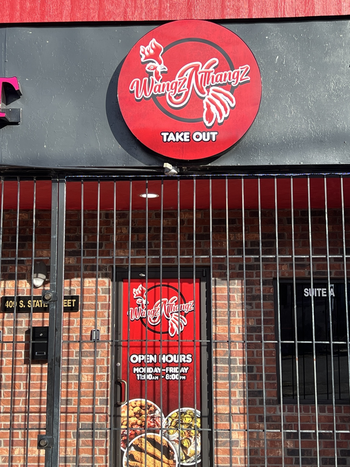Wings N Thangz storefront sign and door graphics produced by T&R Printing Co.